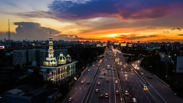 Photo of mosque with road in twilight time