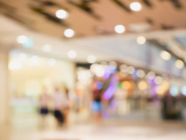 istock Shopping mall store blur background with bokeh 851276298