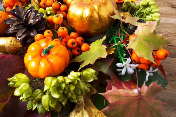 istock Fall symbols pumpkins, autumn leaves, berries and cones 851322188