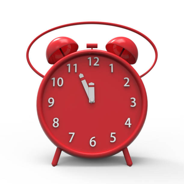 istock alarm clock with little minutes to twelve o'clock 851334856