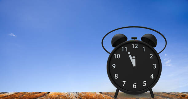 istock alarm clock with little minutes to twelve o'clock 851337290