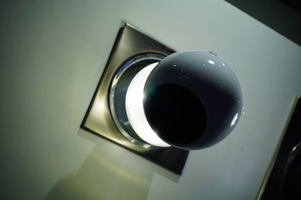 istock Video camera security system on the wall of the building 851337388