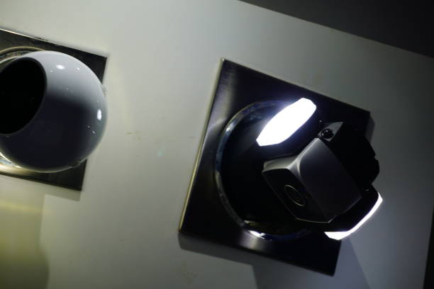 istock Video camera security system on the wall of the building 851337674