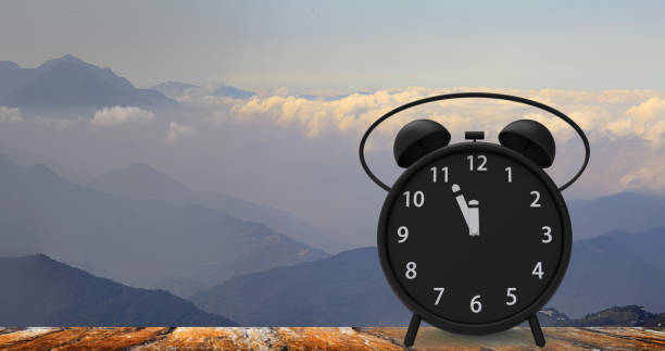 istock alarm clock with little minutes to twelve o'clock 851337936