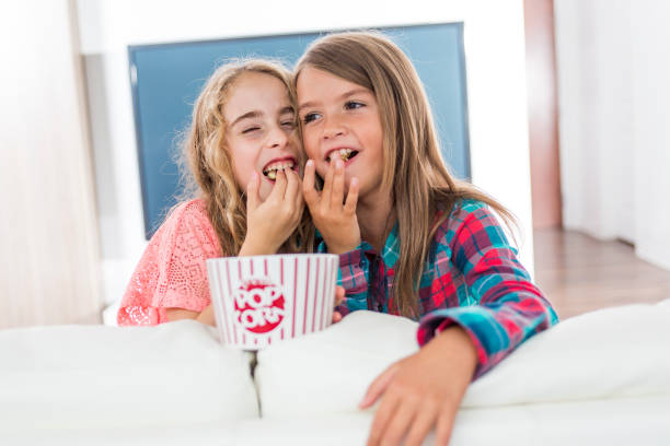 child watching TV at home