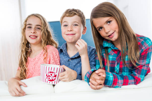 istock child watching TV at home 851364710