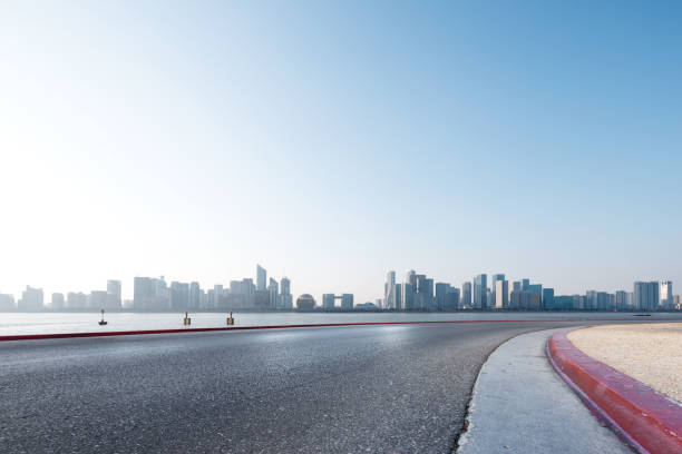 istock empty asphalt road with cityscape of modern city 851369392