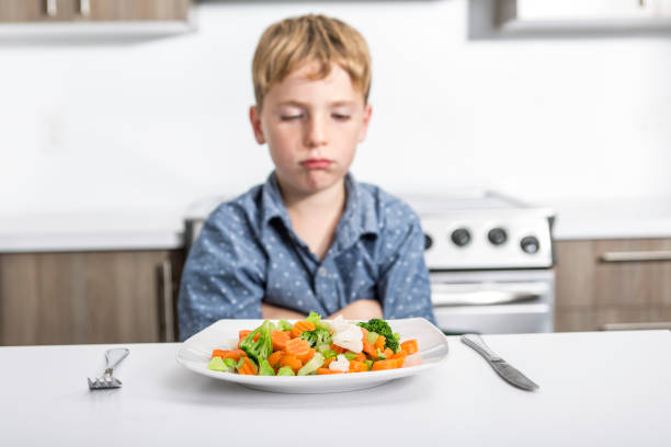 istock boring expression with fresh colorful vegetables child 851384754