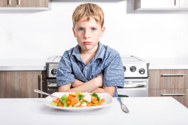istock boring expression with fresh colorful vegetables child 851384816
