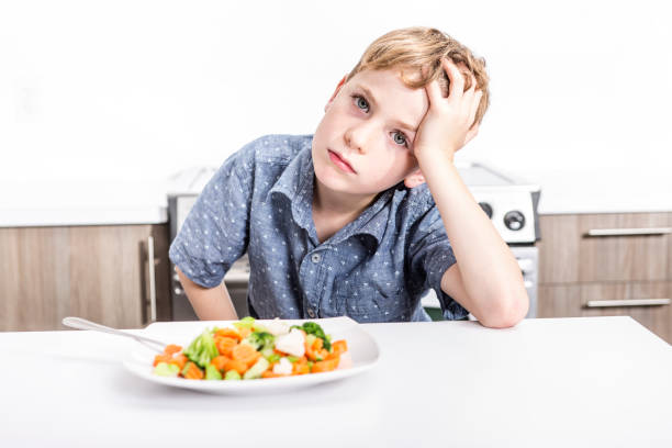 istock boring expression with fresh colorful vegetables child 851384862