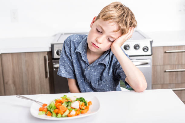istock boring expression with fresh colorful vegetables child 851384942