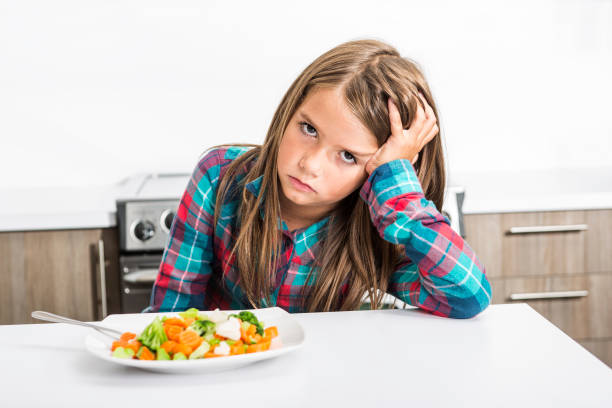 istock boring expression with fresh colorful vegetables child 851387042