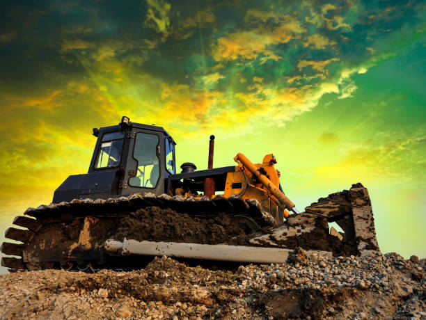 istock bulldozer on a building site at sunset 851393892