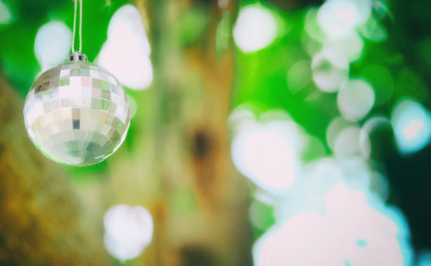 istock Glass mirror hanging under the tree to decorate beautiful. 851408234