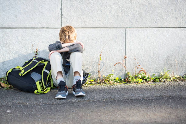 istock student boy outside at school standing 851419860