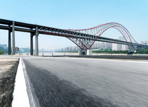 istock empty asphalt road with cityscape of modern city 851420126