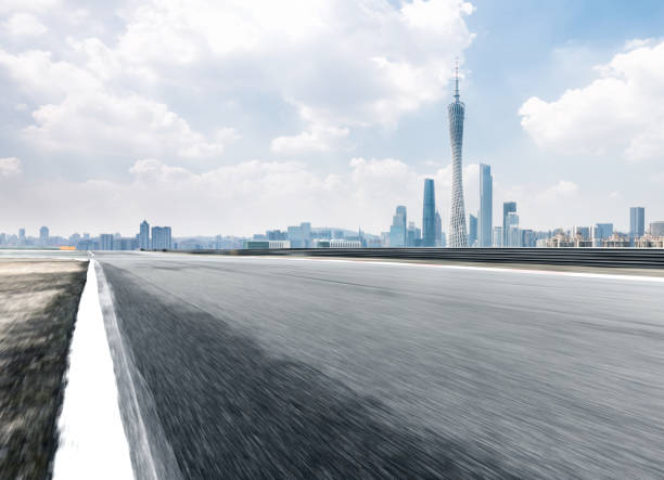 istock empty asphalt road with cityscape of modern city 851420284