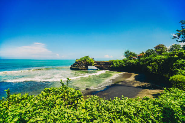 Wide Agnle view of Tanah Lot Temple, Bali Island, Indonesia Wide Agnle view of Tanah Lot Temple, Bali Island, Indonesia tanah lot temple bali indonesia stock pictures, royalty-free photos & images