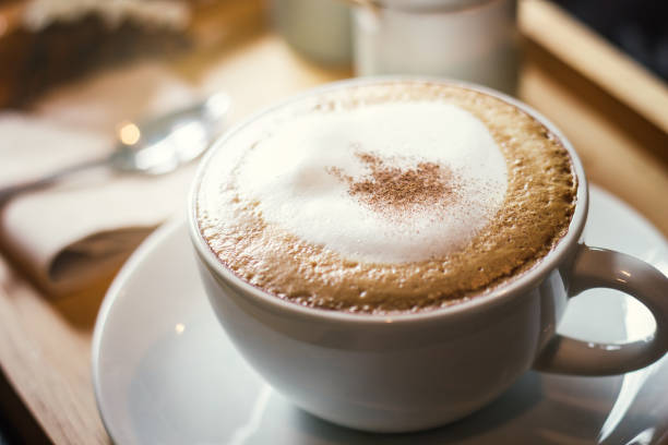 istock Soft focus on capuccino coffee cup, coffee for background - vintage effect process picture 851435162