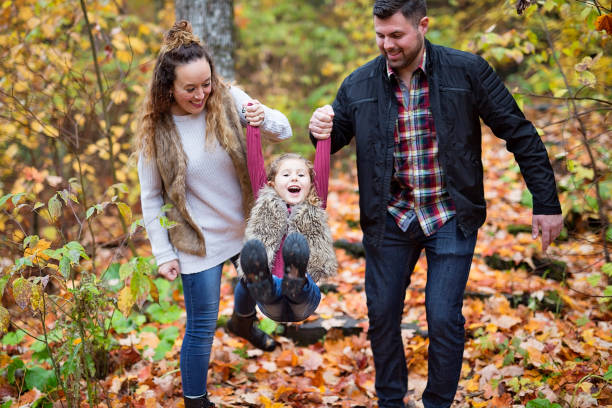 Happy family outdoor in park at autumn A Happy family outdoor in park at autumn. 2000 photos stock pictures, royalty-free photos & images