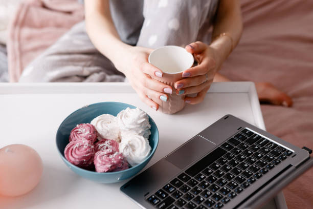 istock Tea, laptop and sweets at morning 851445026