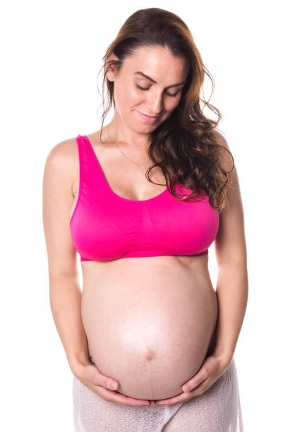 barriga de mulher grávida, sobre fundo branco - pensive only baby girls baby girls baby - fotografias e filmes do acervo