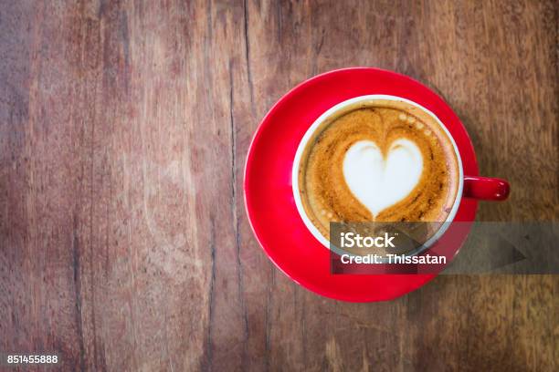 Top View Heart Latte Art Hot Coffee On Old Wooden Table As Love And Romantic Concept Stock Photo - Download Image Now