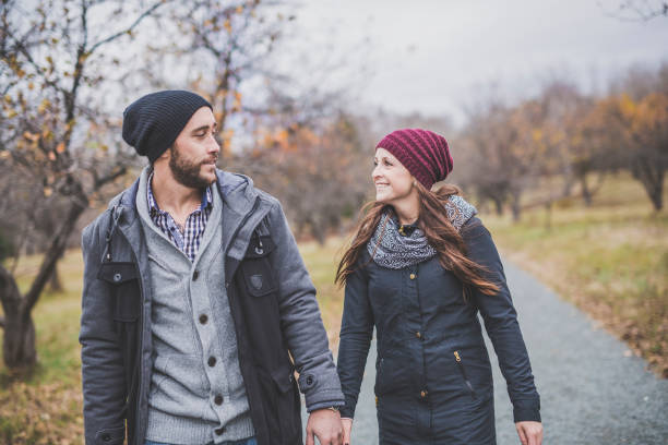 istock Couple in the autumn park 851463554