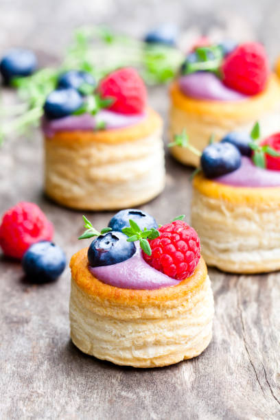 istock puff  pastry stuffed with soft blueberry curd with berries and thyme on rustic wooden background 851474728