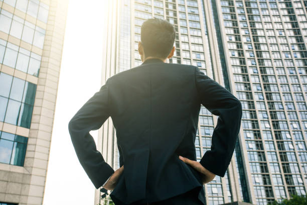 istock Businessman looking city skyline 851475560