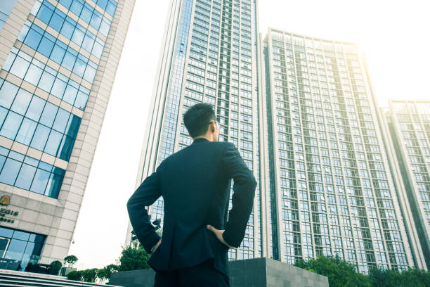 istock Businessman looking city skyline 851475564