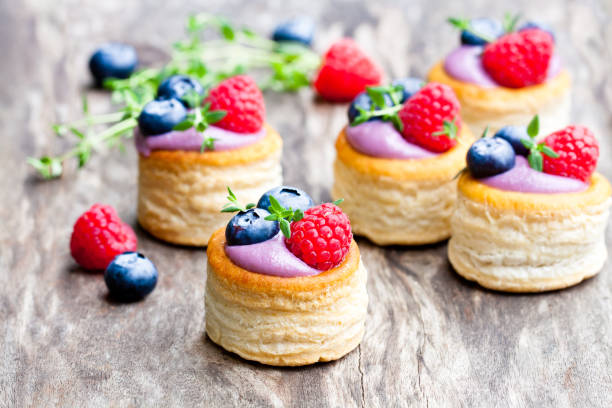 istock puff  pastry stuffed with soft blueberry curd with berries and thyme on rustic wooden background 851483042