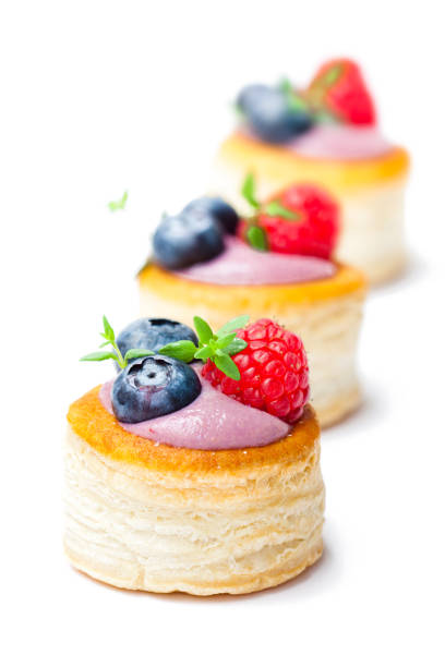 istock puff  pastry stuffed with soft blueberry curd with berries and thyme on white background 851483328