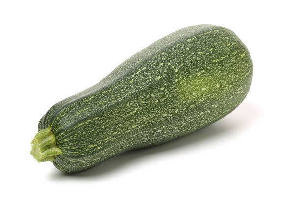istock fresh zucchini isolated  on the white background 851483656