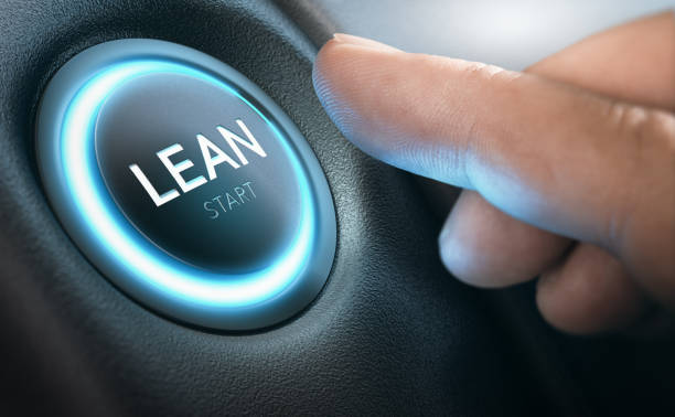 Lean Transformation and Management Concept Finger about to start Lean Transformation by pressing a push button. Composite image between a hand photography and a 3D background. button sewing item photos stock pictures, royalty-free photos & images