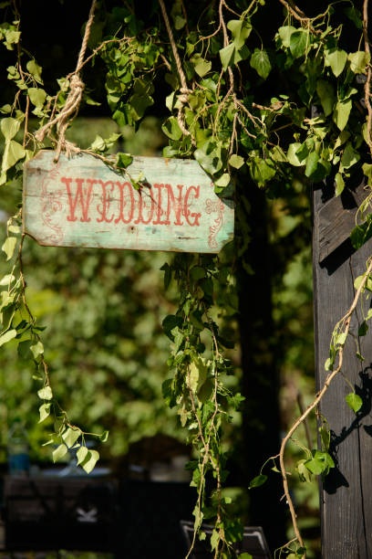 istock inscription wedding on a wooden old board 851493712