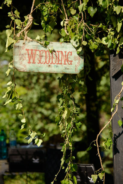 istock inscription wedding on a wooden old board 851493782