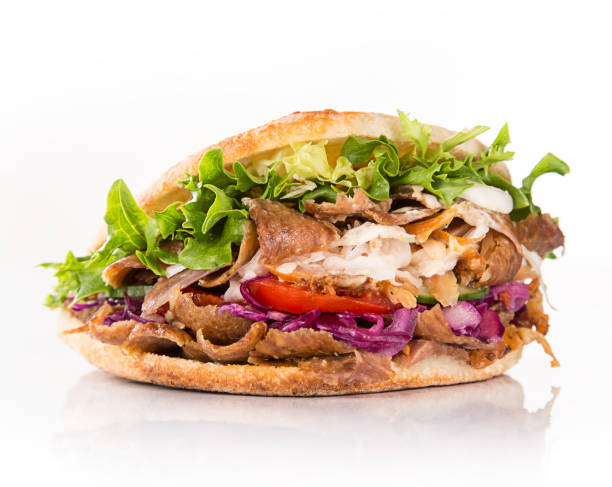 close up of kebab sandwich close up of kebab sandwich on white background tortilla flatbread stock pictures, royalty-free photos & images