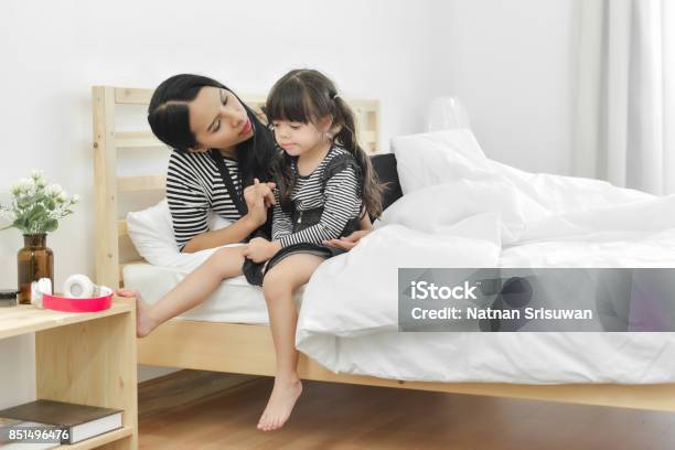 Mother Tries To Reconcile Her Daughter Stock Photo - Download Image Now - Child, Mother, Parent