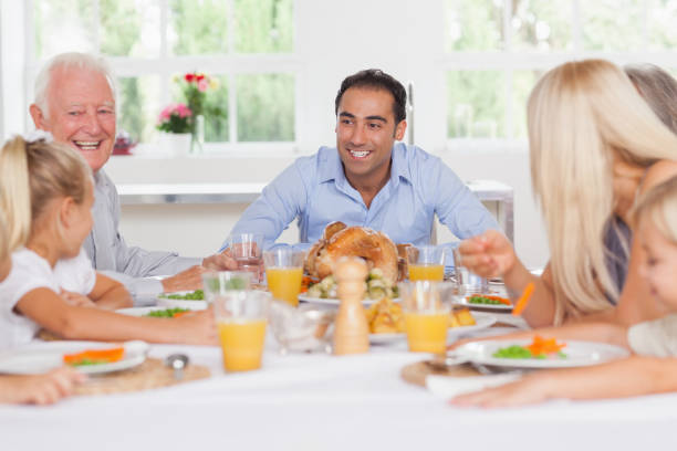 istock Happy family at thanksgiving 851497408