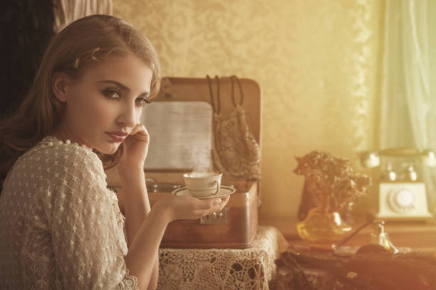 istock Retro woman drinking hot coffee 851497422