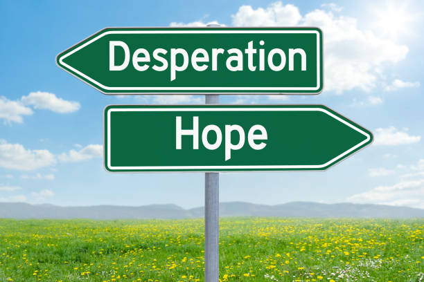 Two green direction signs - Desperation or Hope