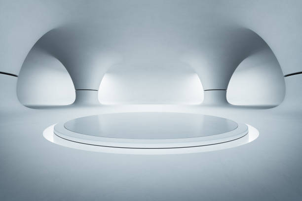 istock Abstract interior design of modern showroom with empty white floor and smooth concrete wall background, Podium for product display in future architecture or alien house 851499968