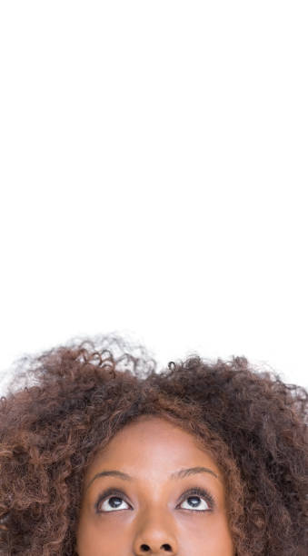 istock Brunette woman looking up to large copy space 851501650