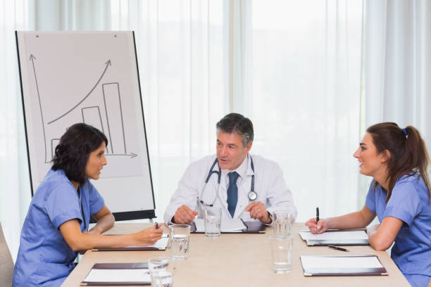 istock Doctor having meeting with two nurses 851502662