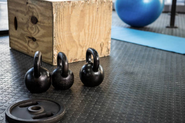 istock kettlebells and wooden block 851502784