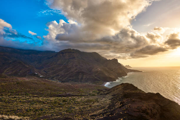 horizontal nature background with mountain range in Grand Canary and Atlantic Ocean.