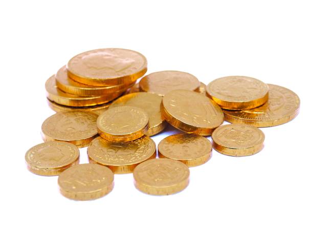 istock Gold coins on white background 851505720