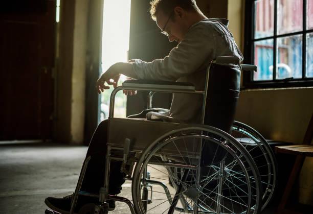 istock Alcoholic man sitting on wheelchair 851506062