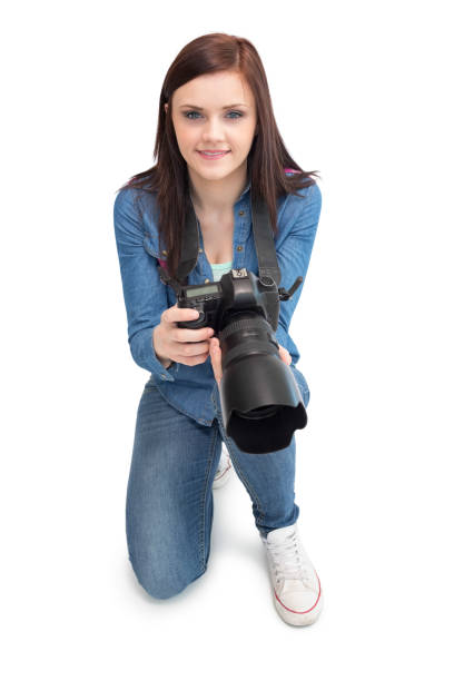 istock Cheerful young photographer posing 851538000